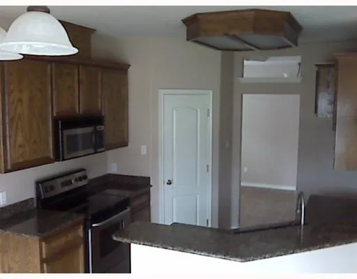 a kitchen with a sink and a cabinets