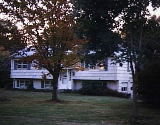 6 Toll Gate Road Monroe, CT 06468 - Photo 1 of 1 a view of a house with a tree in a yard