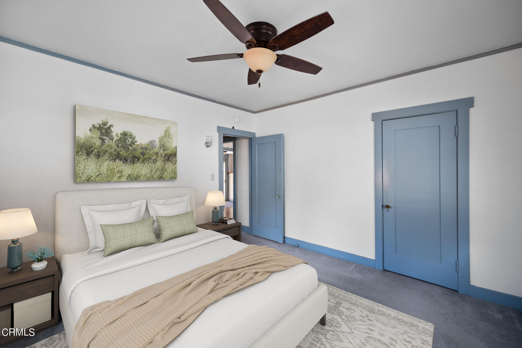 768 Atchison Street Pasadena, CA 91104 - Photo 11 of 23 a bedroom with a large bed and a chandelier