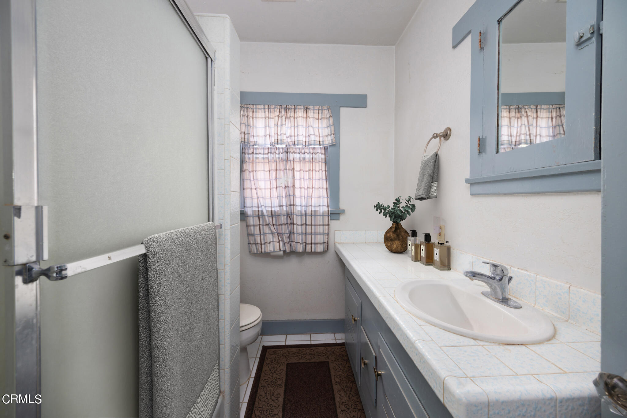 768 Atchison Street Pasadena, CA 91104 - Photo 13 of 23 a bathroom with a sink and a toilet
