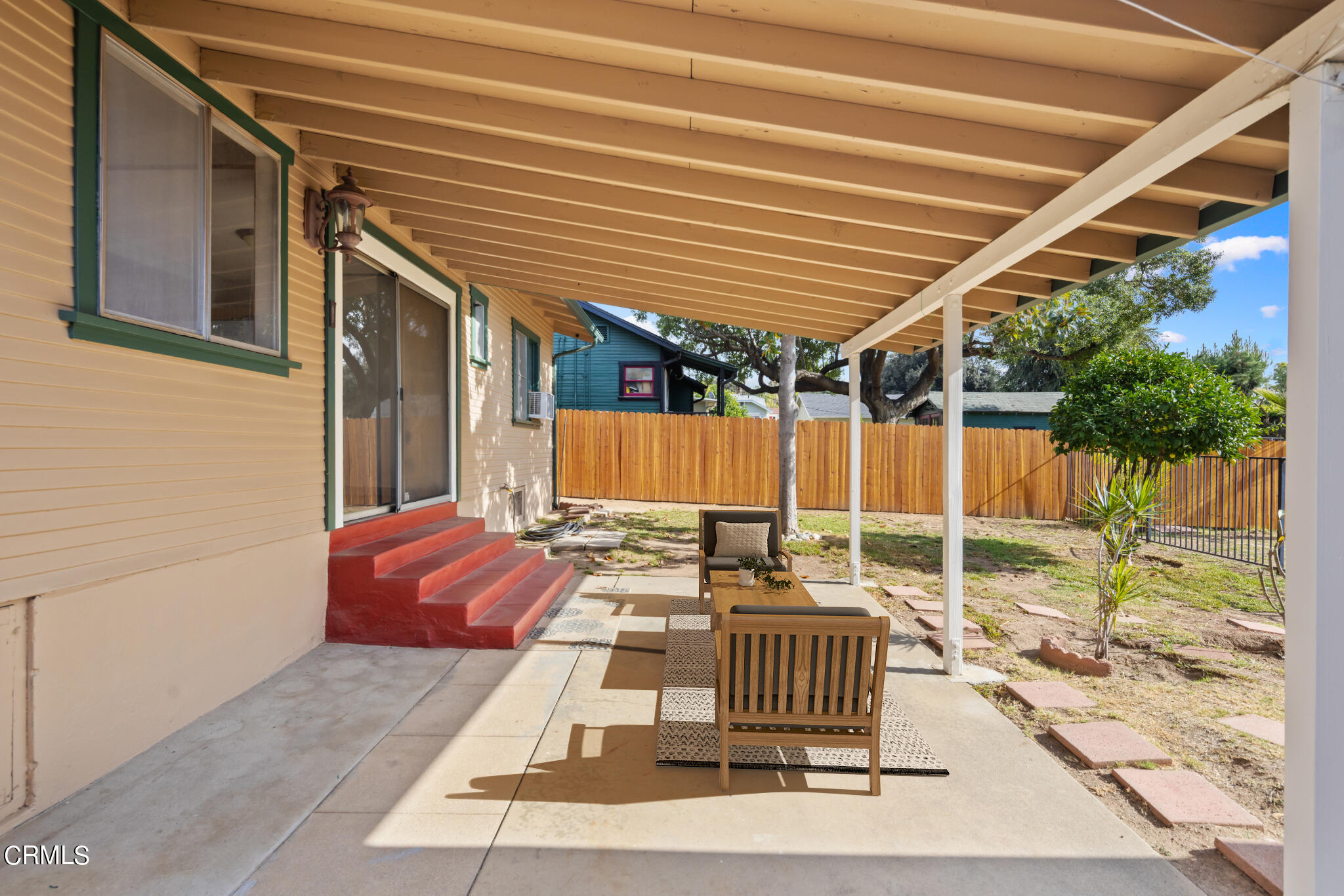 768 Atchison Street Pasadena, CA 91104 - Photo 14 of 23 a backyard of a house with garden and outdoor seating
