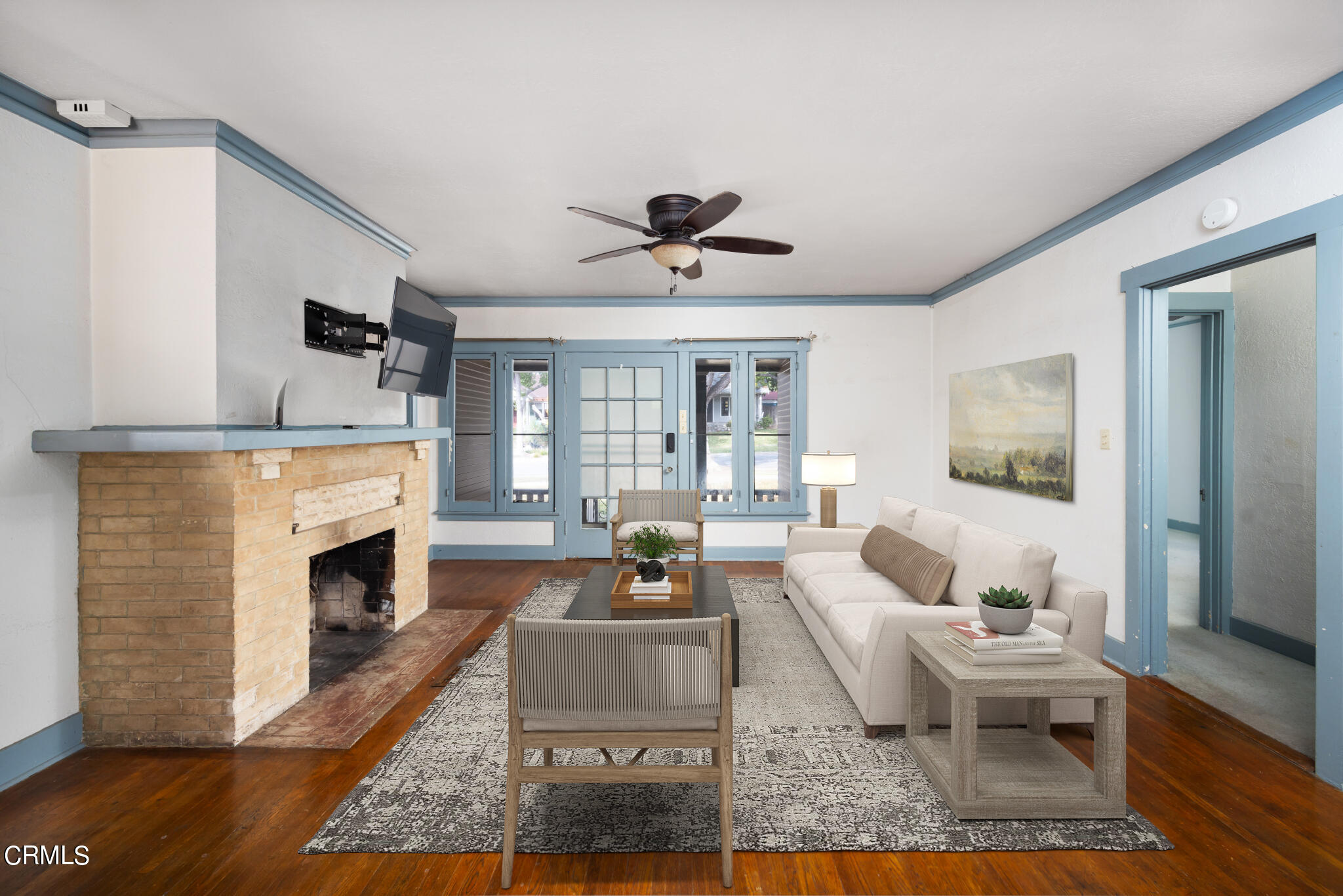 768 Atchison Street Pasadena, CA 91104 - Photo 6 of 23 a living room with furniture fireplace and window