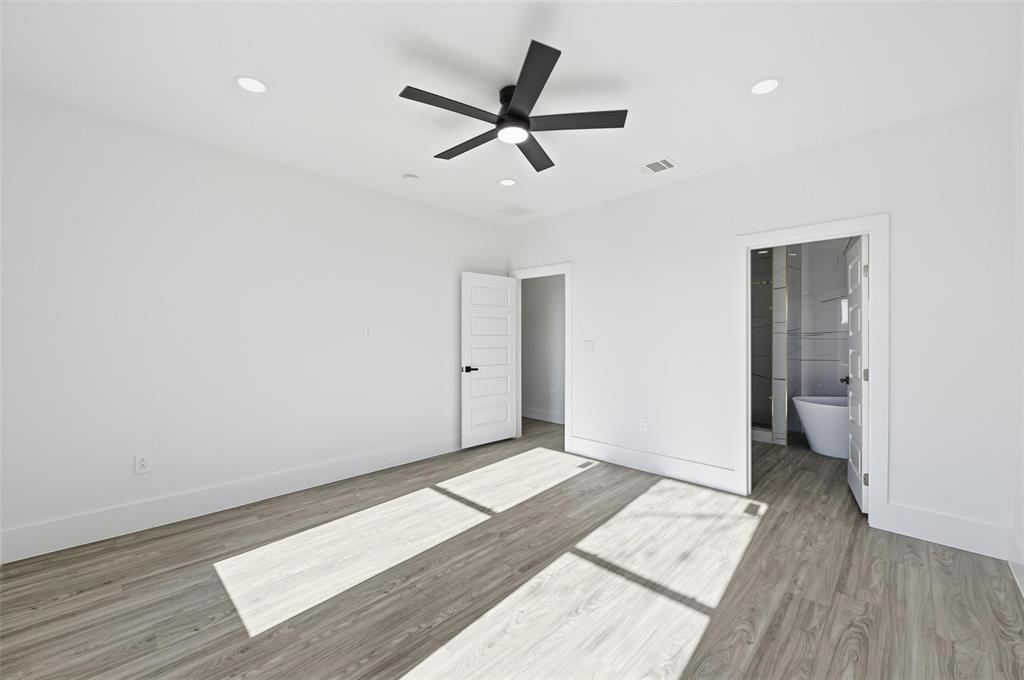 2618 Gooch Street Dallas, TX 75241 - Photo 11 of 28 a view of an empty room and wooden floor