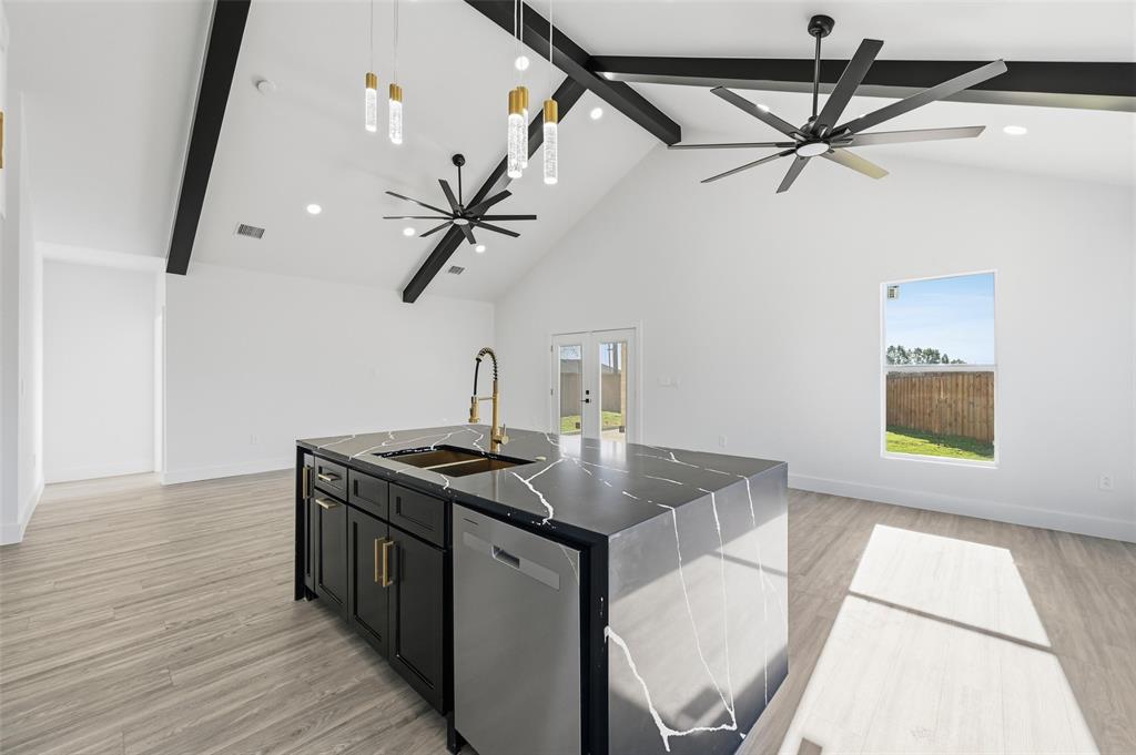 2618 Gooch Street Dallas, TX 75241 - Photo 28 of 28 a kitchen with stainless steel appliances granite countertop a stove and a sink