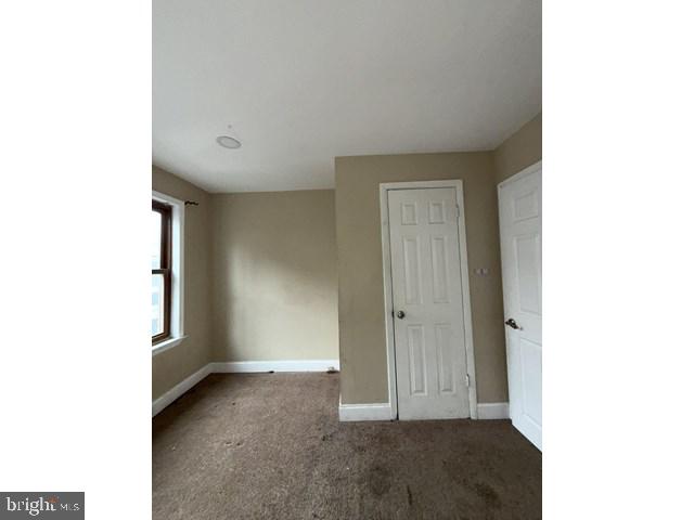 1611 Lemmon Street Baltimore, MD 21223 - Photo 12 of 20 a view of an empty room with windows