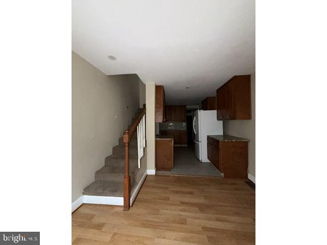1611 Lemmon Street Baltimore, MD 21223 - Photo 2 of 20 a view of a hallway with stairs