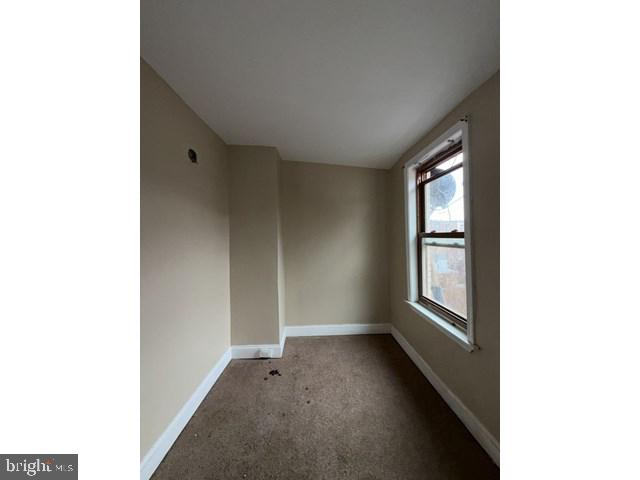 1611 Lemmon Street Baltimore, MD 21223 - Photo 9 of 20 a view of an empty room with a window