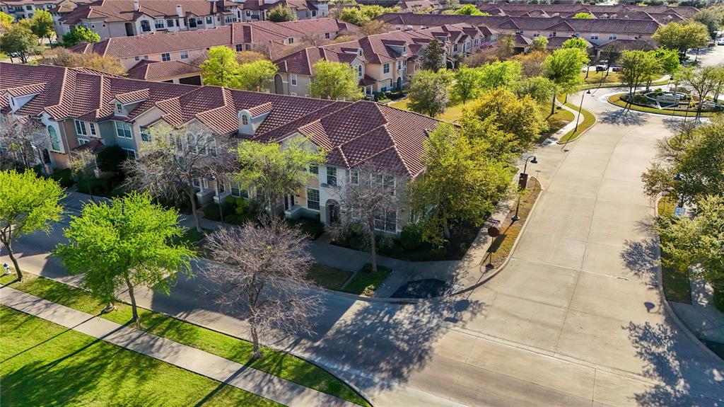 6851 Verde Irving, TX 75039 - Photo 5 of 40 an aerial view of a house with a garden and lake view