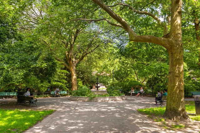 a view of a wrought iron fences in front of house