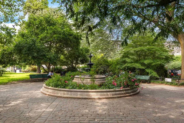 a view of a city with tall buildings