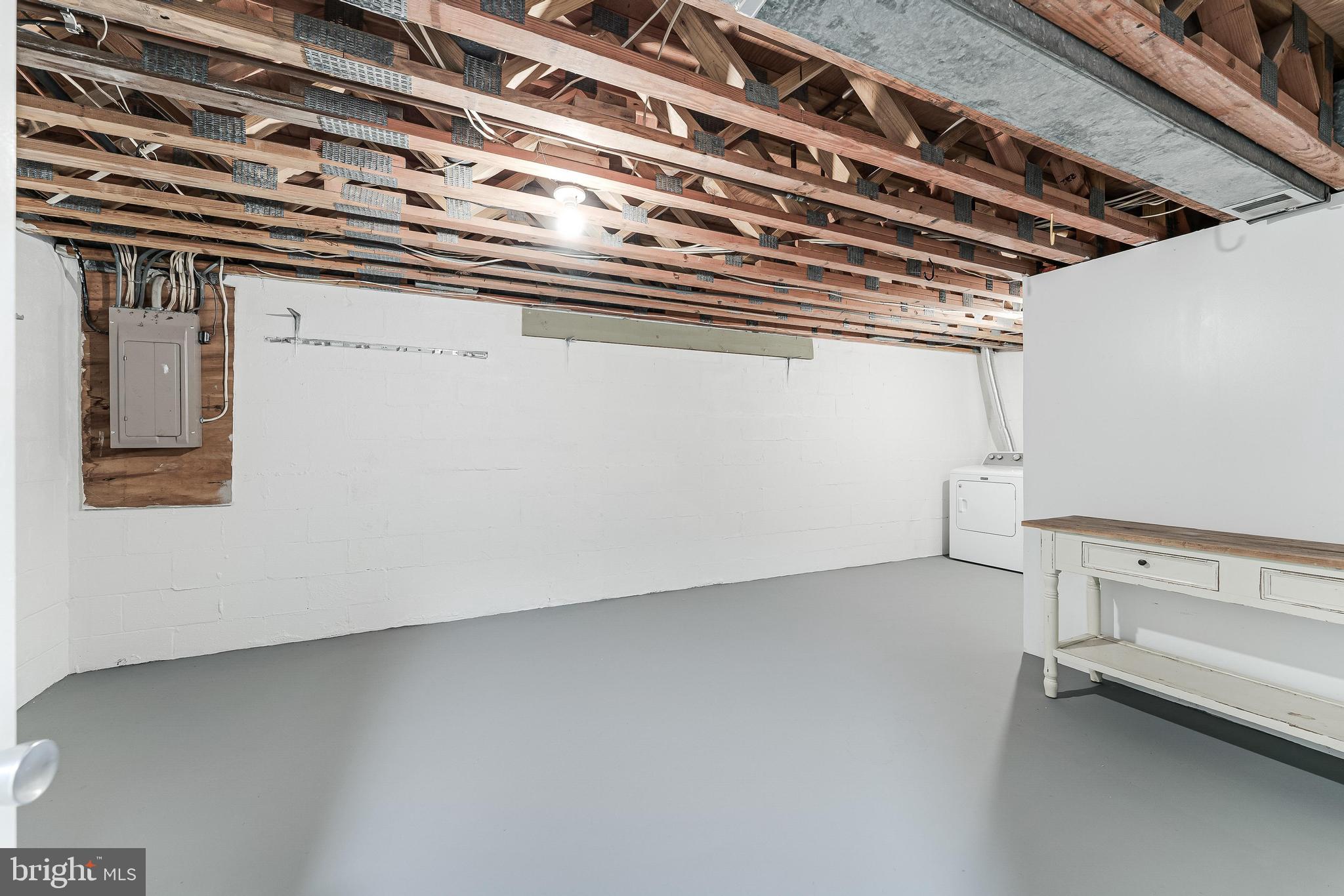 12023 Insha Court Reston, VA 20191 - Photo 13 of 52 a view of a room with racks on the wall