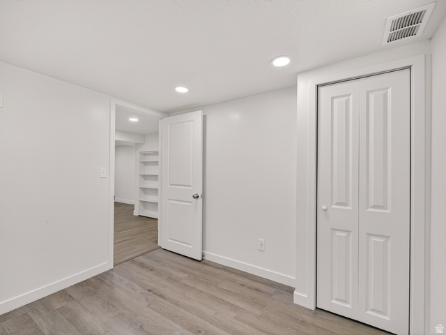 74 South 300 East Springville, UT 84663 - Photo 21 of 48 Neutral-toned wood-finish flooring complements the crisp white walls and trim