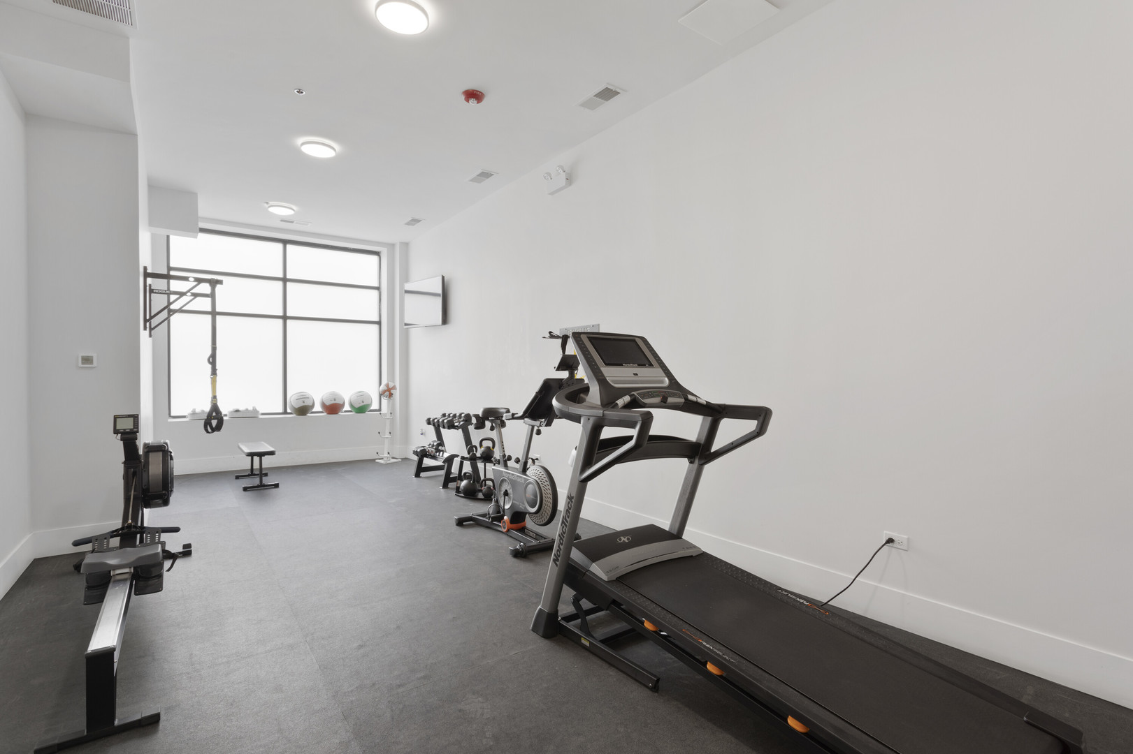 1531 West Howard Street, Unit 407 Chicago, IL 60626 - Photo 12 of 15 a view of a room with gym equipment