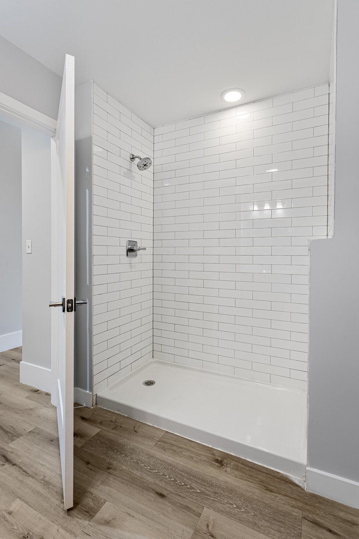 1531 West Howard Street, Unit 407 Chicago, IL 60626 - Photo 6 of 15 a bathroom with a shower