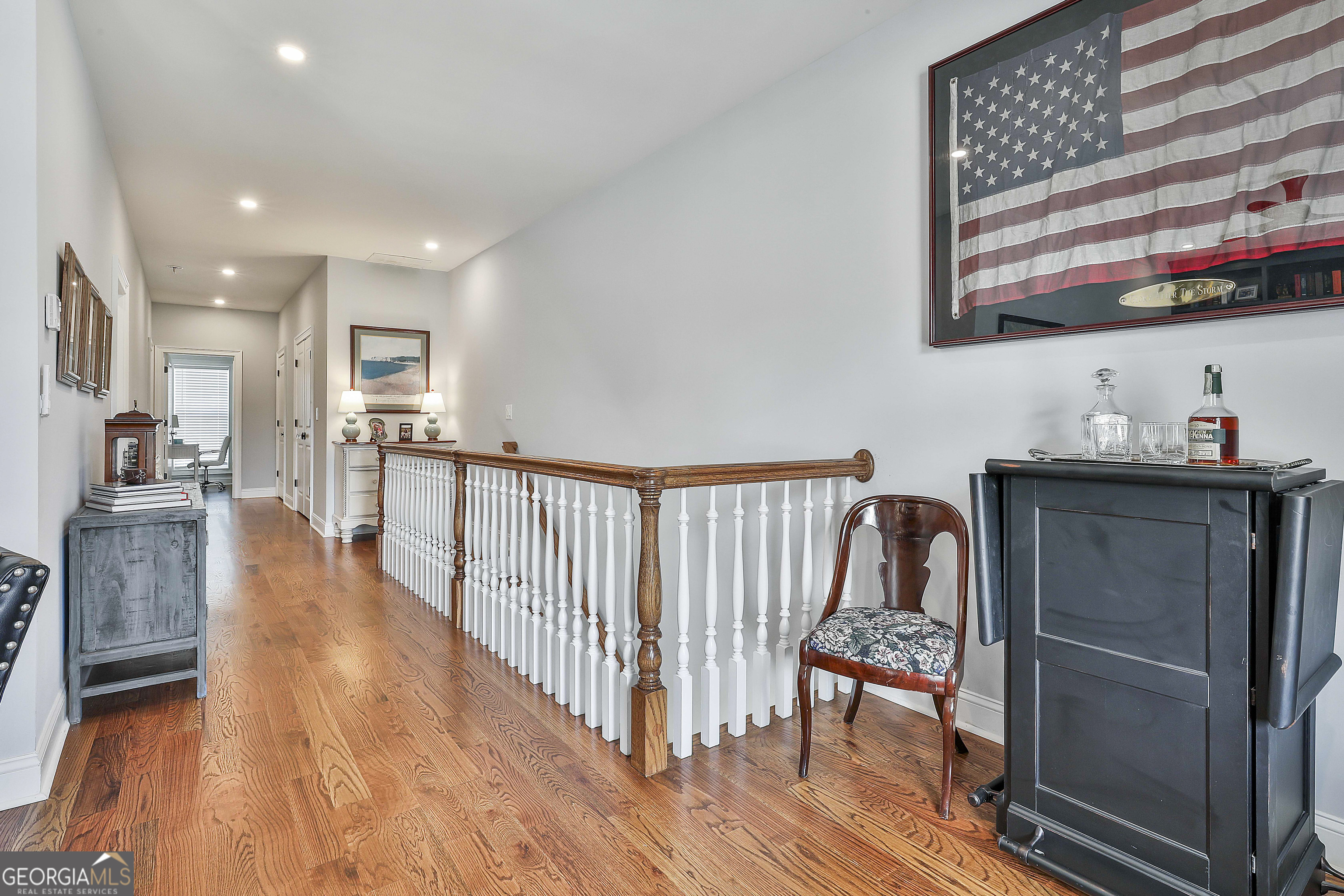 6 Casey Road Newnan, GA 30263 - Photo 33 of 46 a view of a hallway with wooden floor and dining room