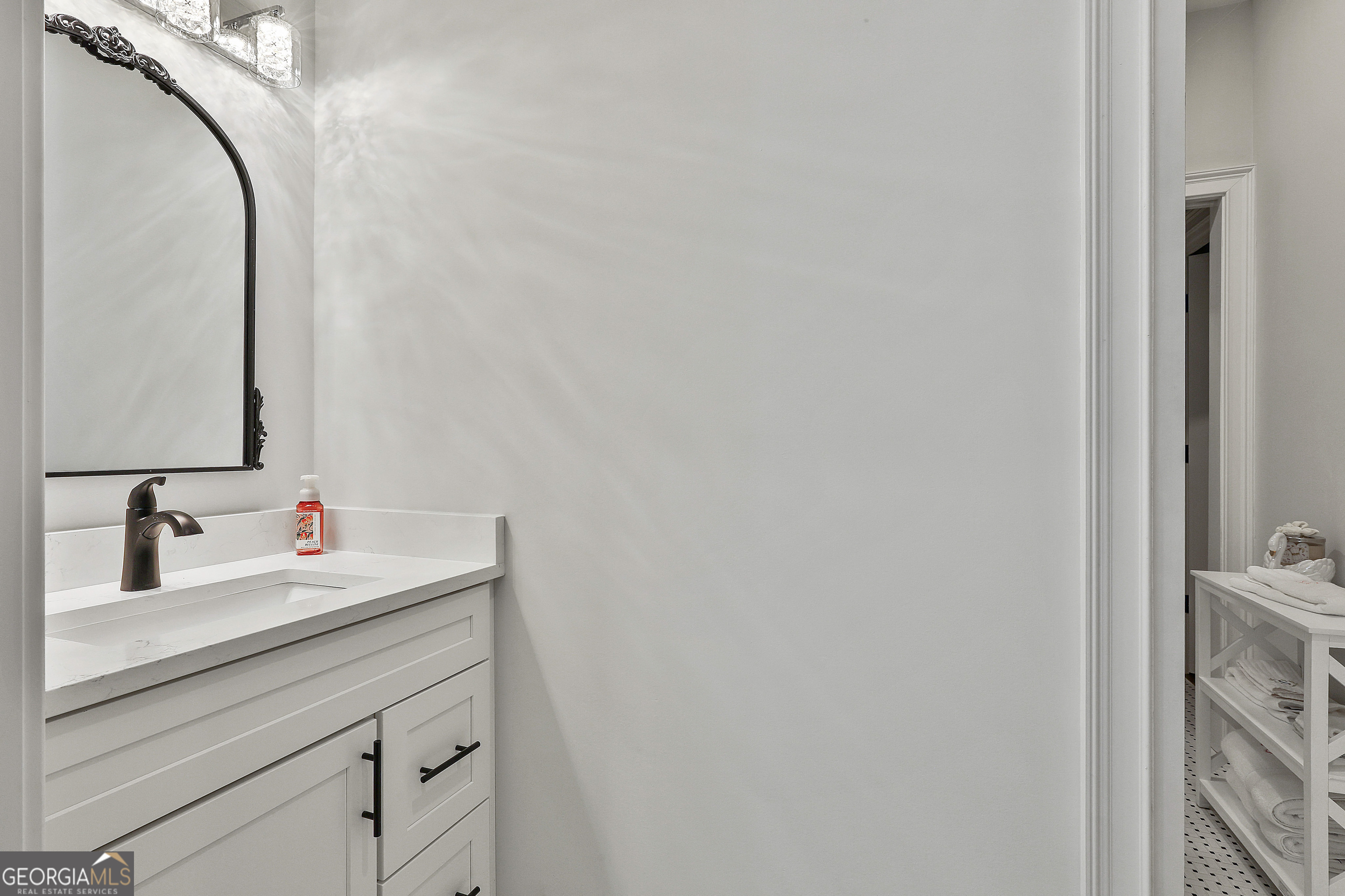 6 Casey Road Newnan, GA 30263 - Photo 35 of 46 a bathroom with a sink and a mirror