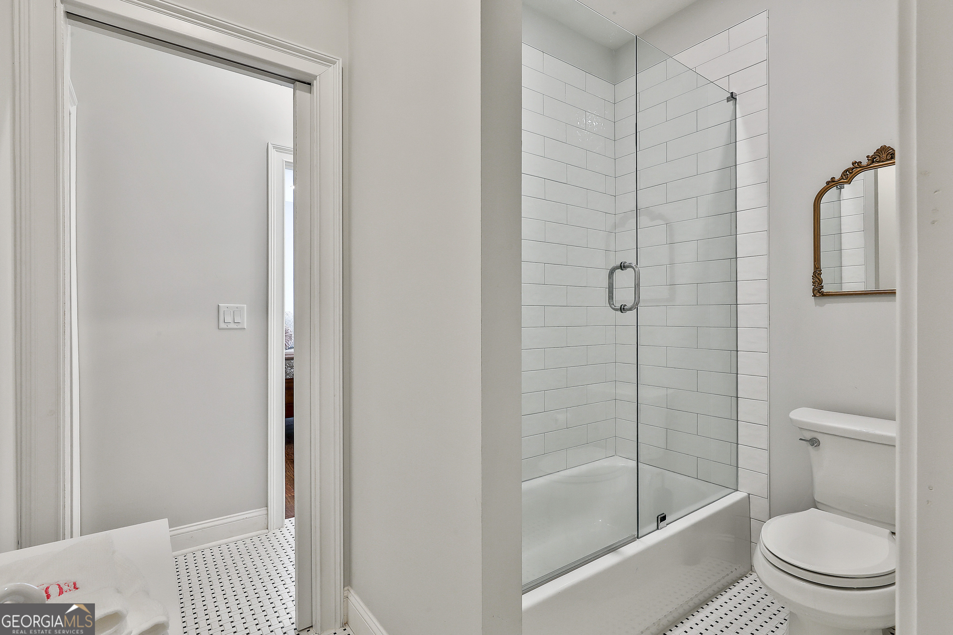 6 Casey Road Newnan, GA 30263 - Photo 36 of 46 a bathroom with a shower and a toilet