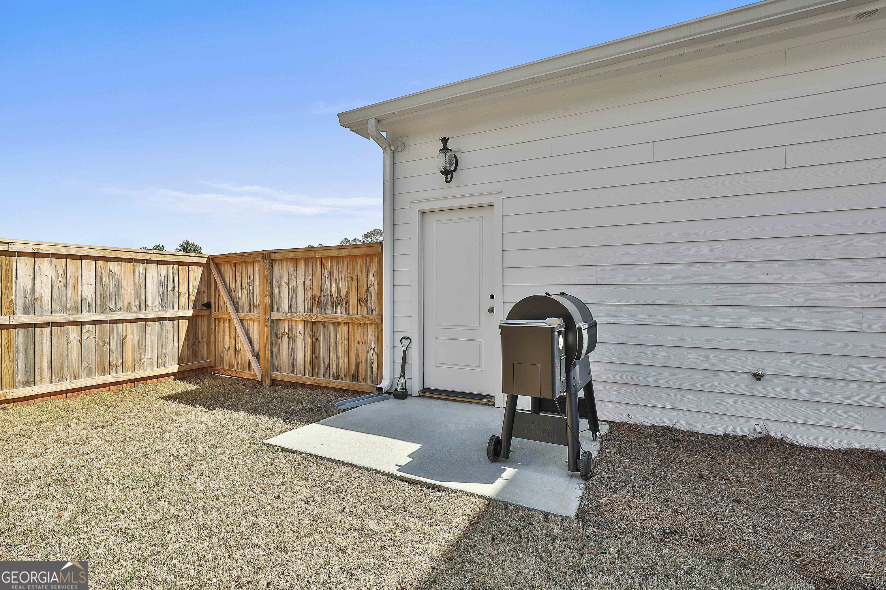 6 Casey Road Newnan, GA 30263 - Photo 42 of 46 a view of a porch with a bench