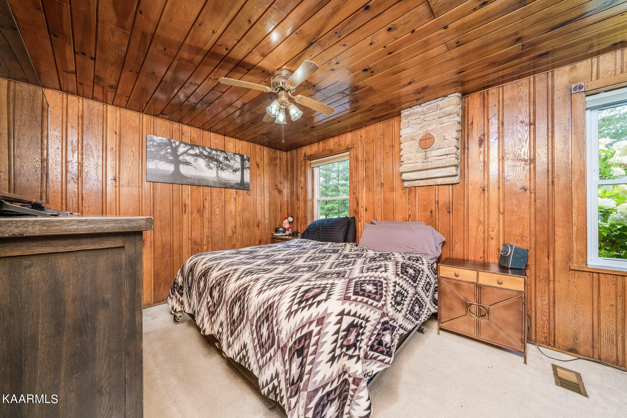 1360 Deep Draw Road Crossville, TN 38555 - Photo 15 of 40 a bedroom with a bed and wooden floor