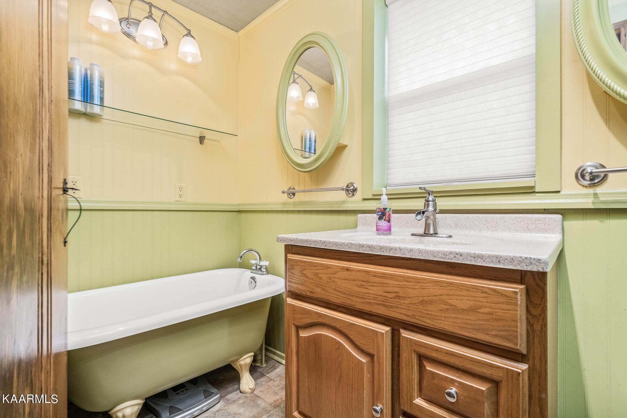 1360 Deep Draw Road Crossville, TN 38555 - Photo 17 of 40 a bathroom with a sink and a mirror