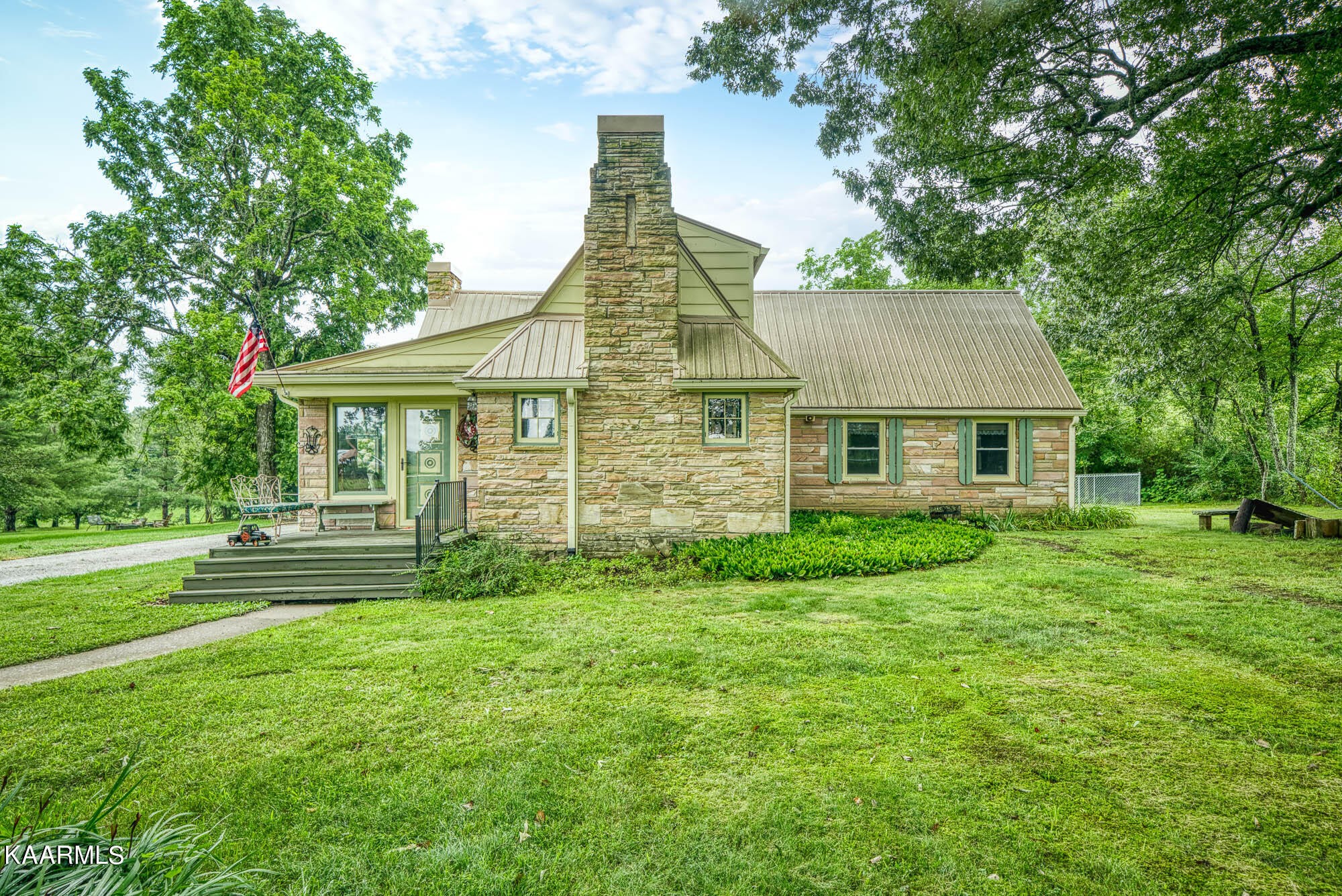 1360 Deep Draw Road Crossville, TN 38555 - Photo 2 of 40 a front view of a house with a yard