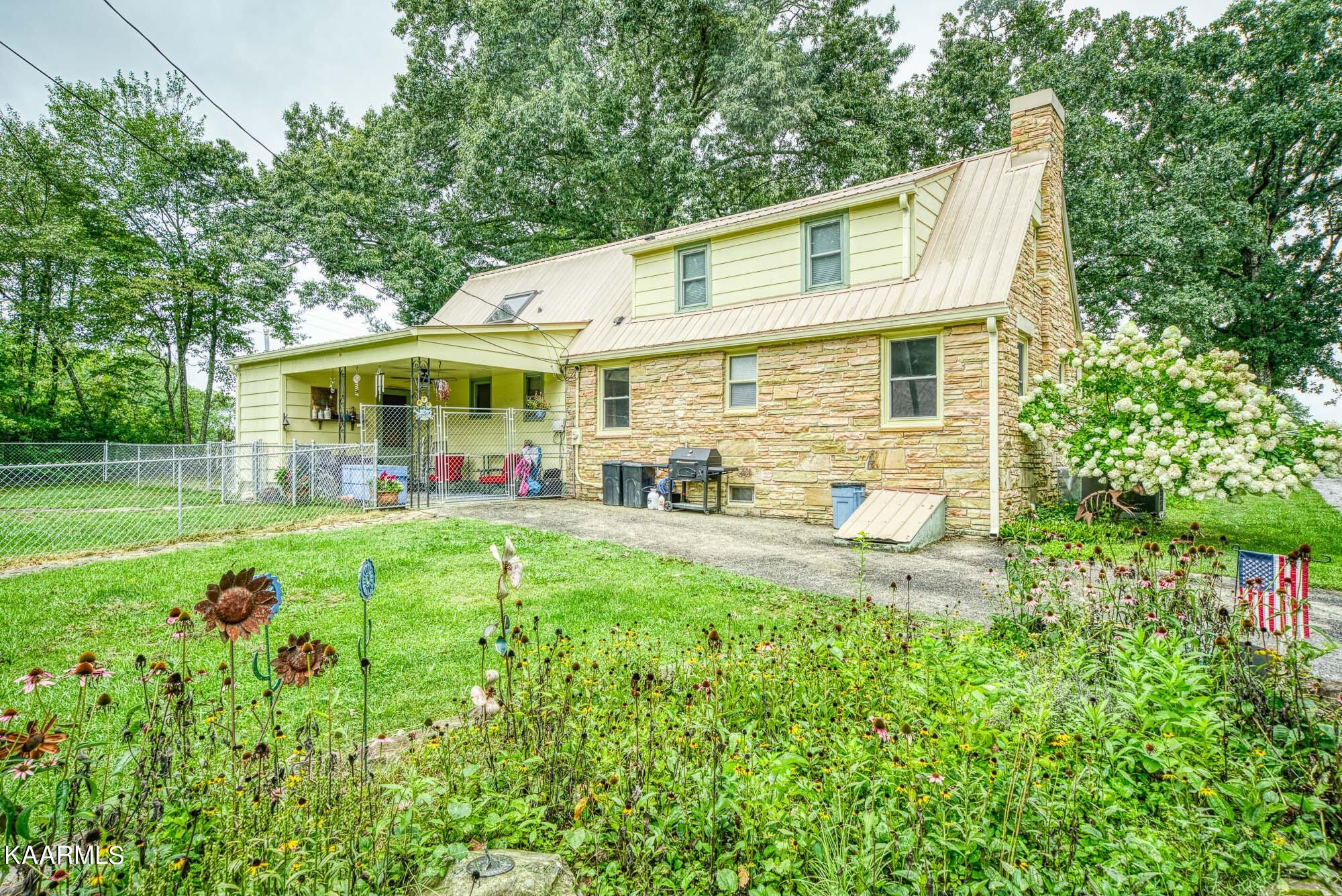 1360 Deep Draw Road Crossville, TN 38555 - Photo 29 of 40 a front view of house with yard and outdoor seating