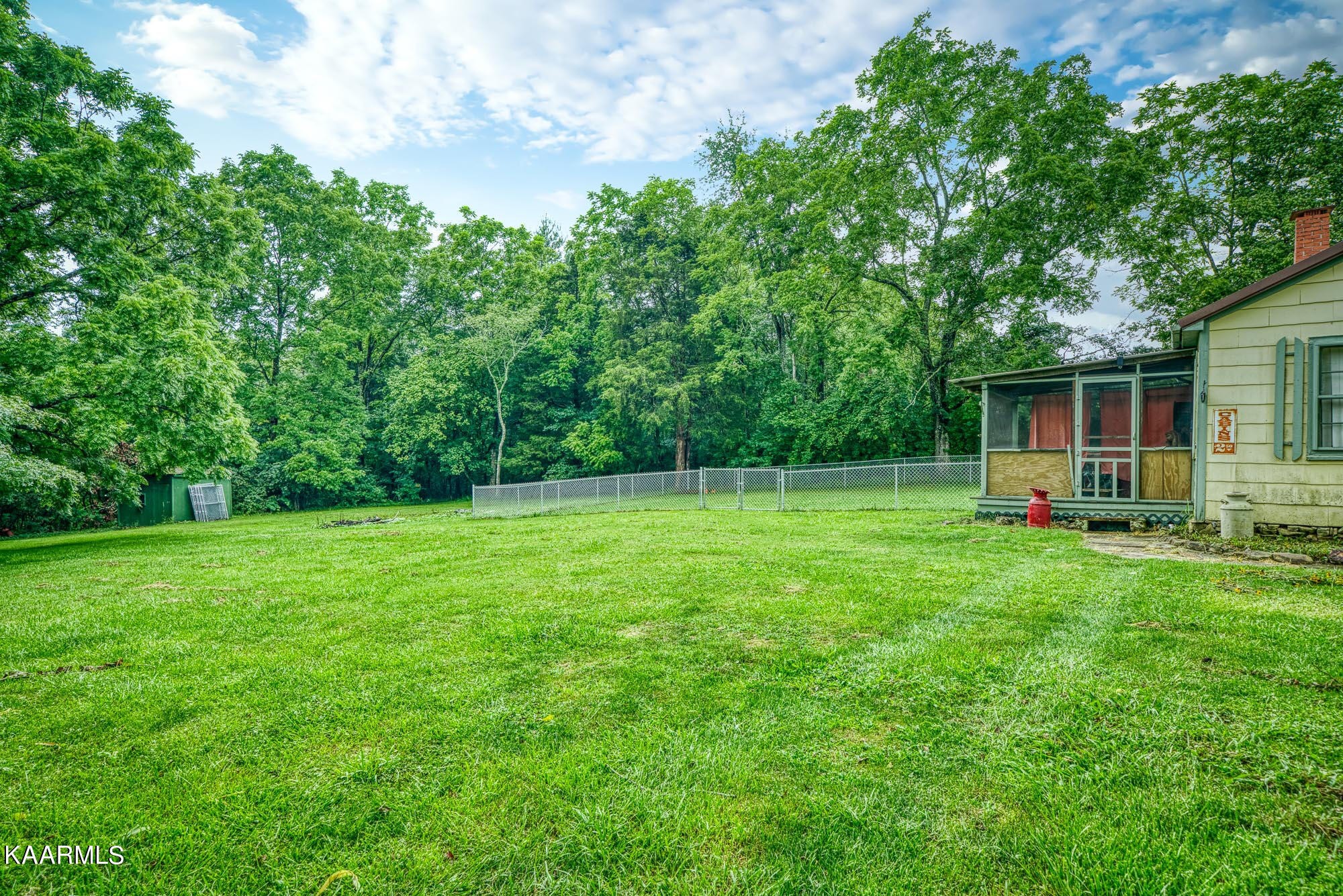 1360 Deep Draw Road Crossville, TN 38555 - Photo 38 of 40 a view of a house with backyard and sitting area