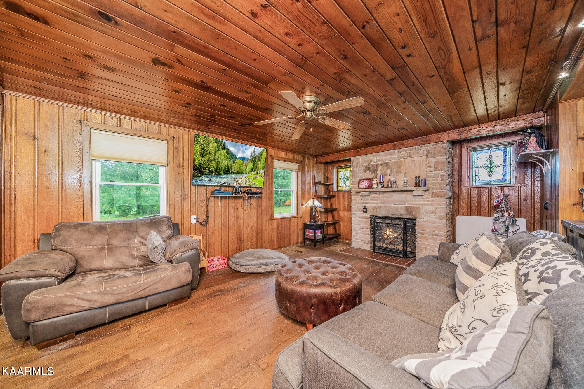 1360 Deep Draw Road Crossville, TN 38555 - Photo 6 of 40 a living room with furniture and a fireplace
