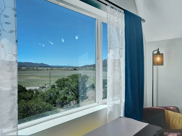 a view of a balcony with an outdoor space