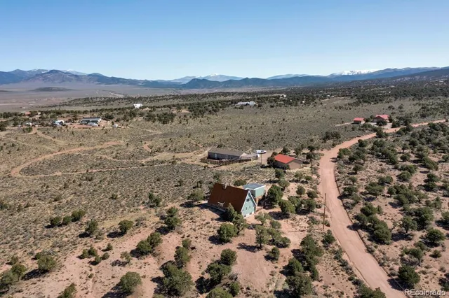 a view of a large body of water with a building in the background