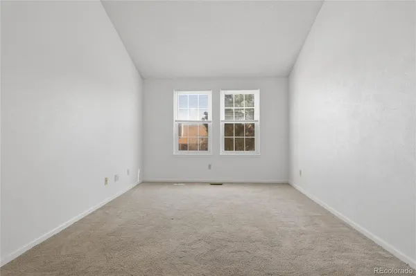 an empty room with an entryway