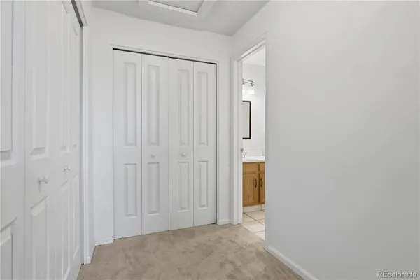 an empty room with a empty space and windows