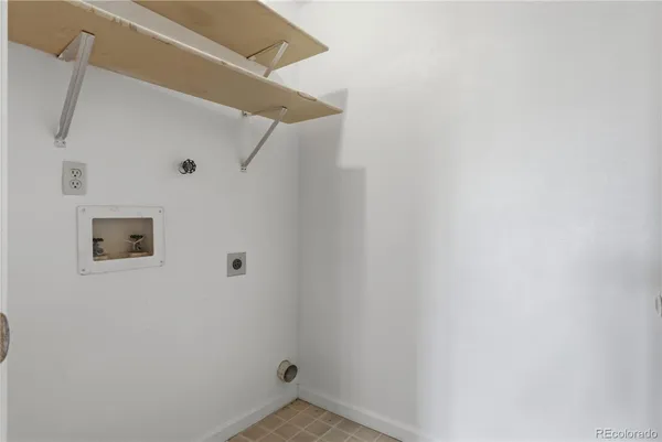 a view of balcony with wooden floor
