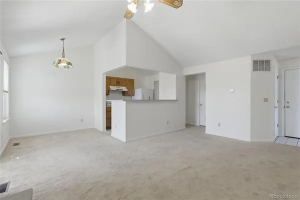 a view of a kitchen with a sink