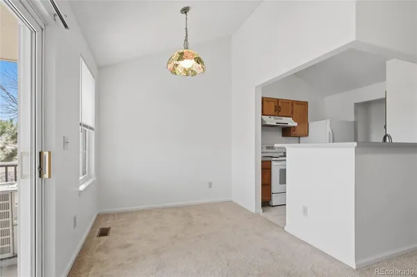 a view of a kitchen with a sink cabinets and window
