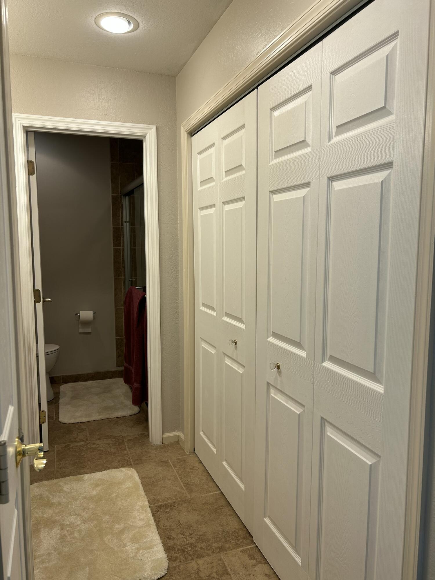 1251 South Federal Highway, Unit 1160 Boca Raton, FL 33432 - Photo 14 of 21 a view of a hallway with wooden floor