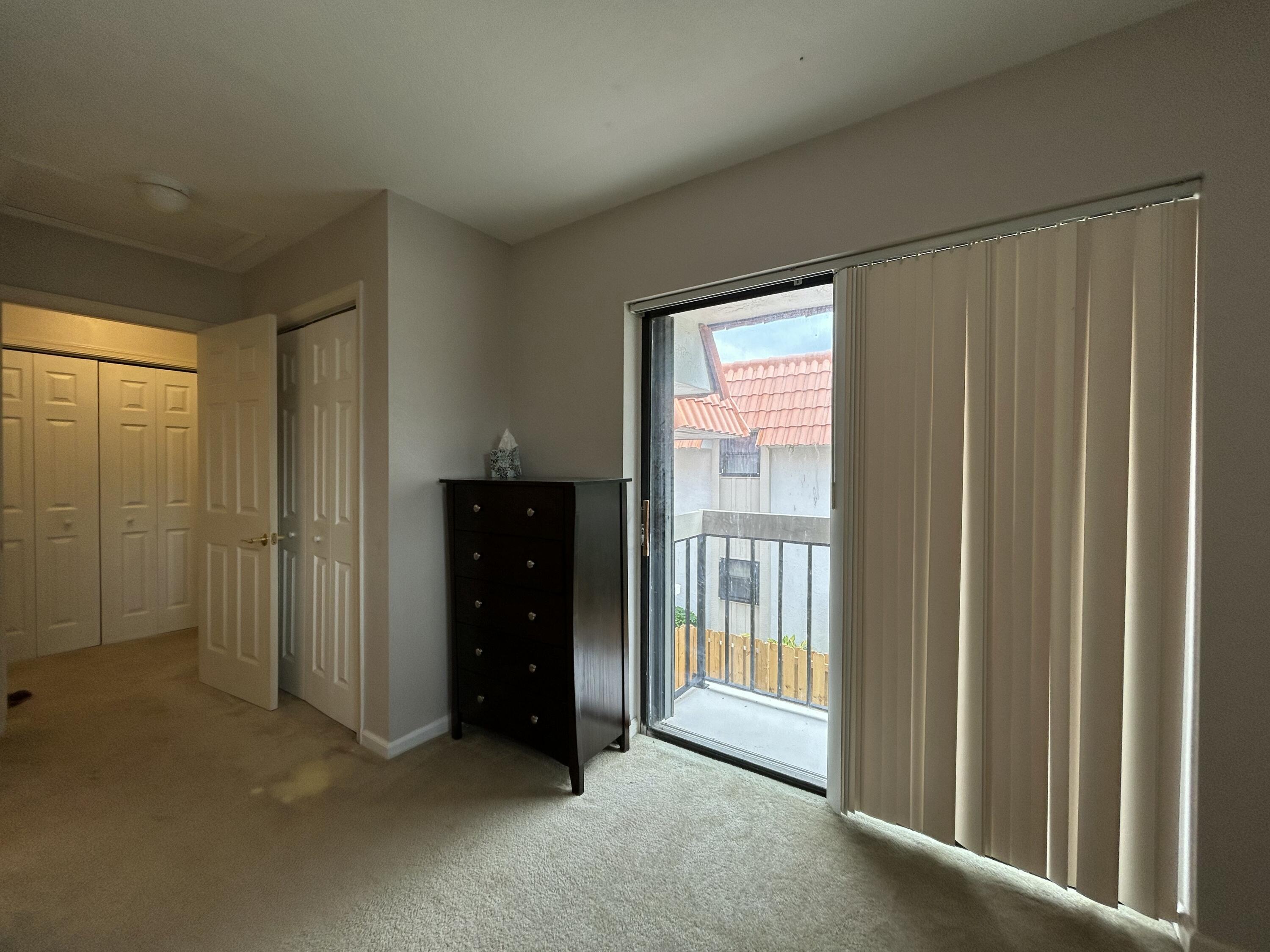 1251 South Federal Highway, Unit 1160 Boca Raton, FL 33432 - Photo 17 of 21 a view of an empty room and window