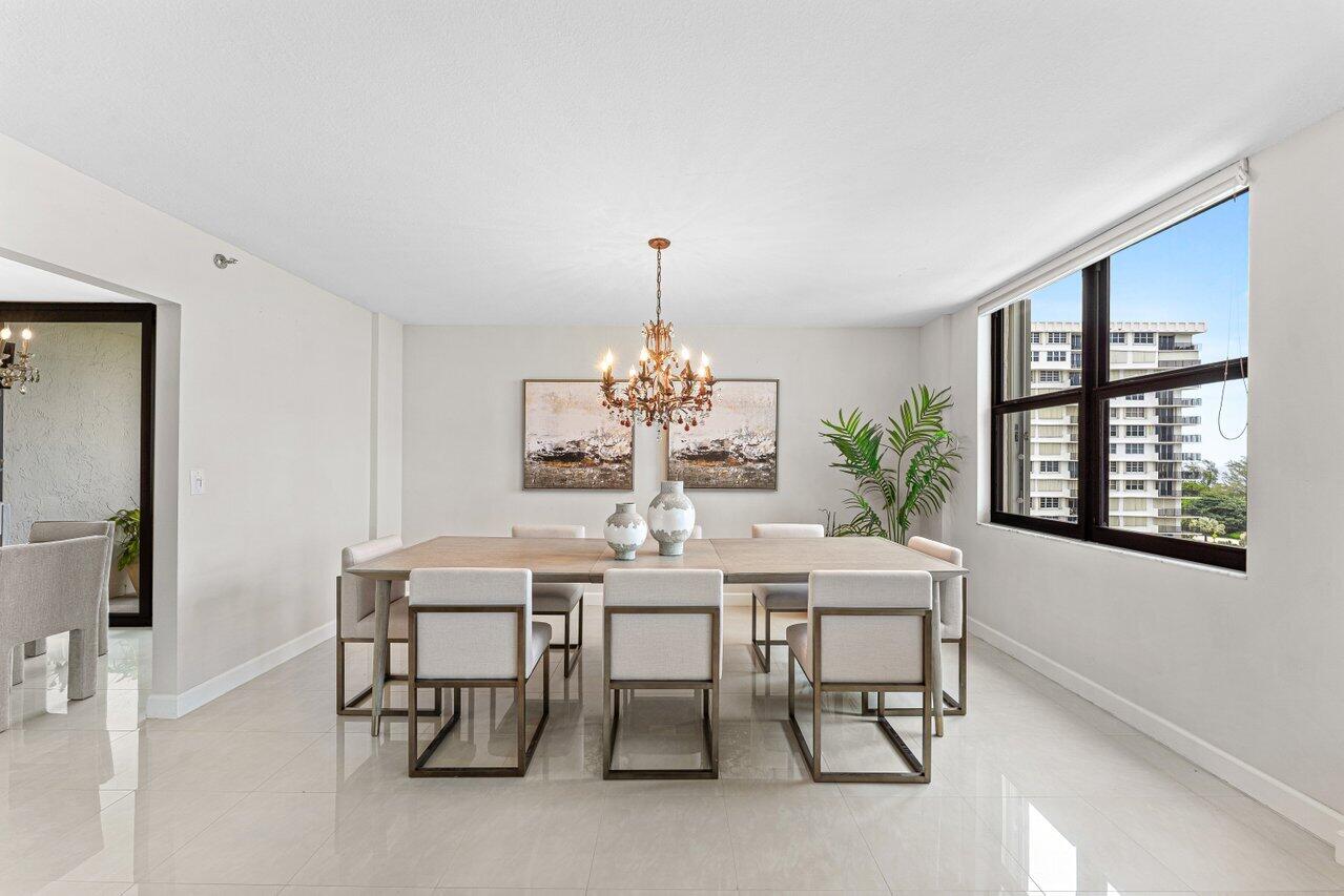 2003 North Ocean Boulevard, Unit 902 Boca Raton, FL 33431 - Photo 14 of 45 a dining room with furniture and window