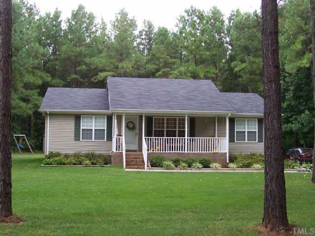1795 Old Allensville Road Roxboro, NC 27574 - Photo 1 of 1 a view of a house with a yard