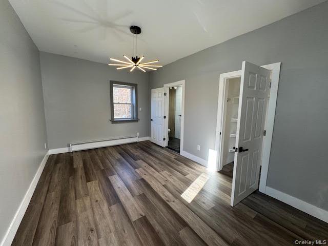 3135 Rte 9W, Unit 2 New Windsor, NY 12553 - Photo 17 of 27 an empty room with wooden floor and windows