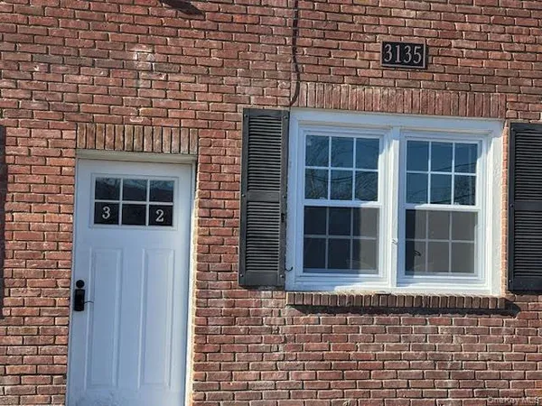 a front view of a house with a window