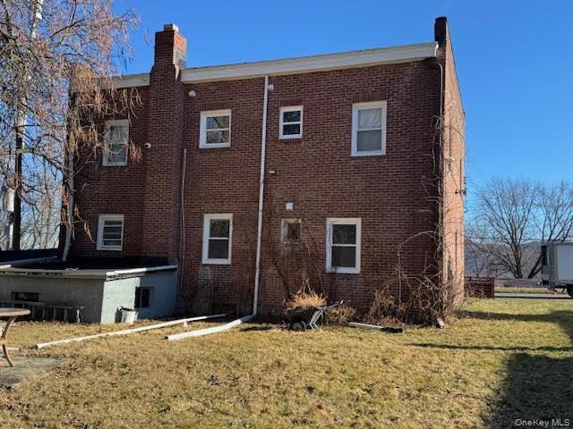 3135 Rte 9W, Unit 2 New Windsor, NY 12553 - Photo 24 of 27 a front view of a house with a yard