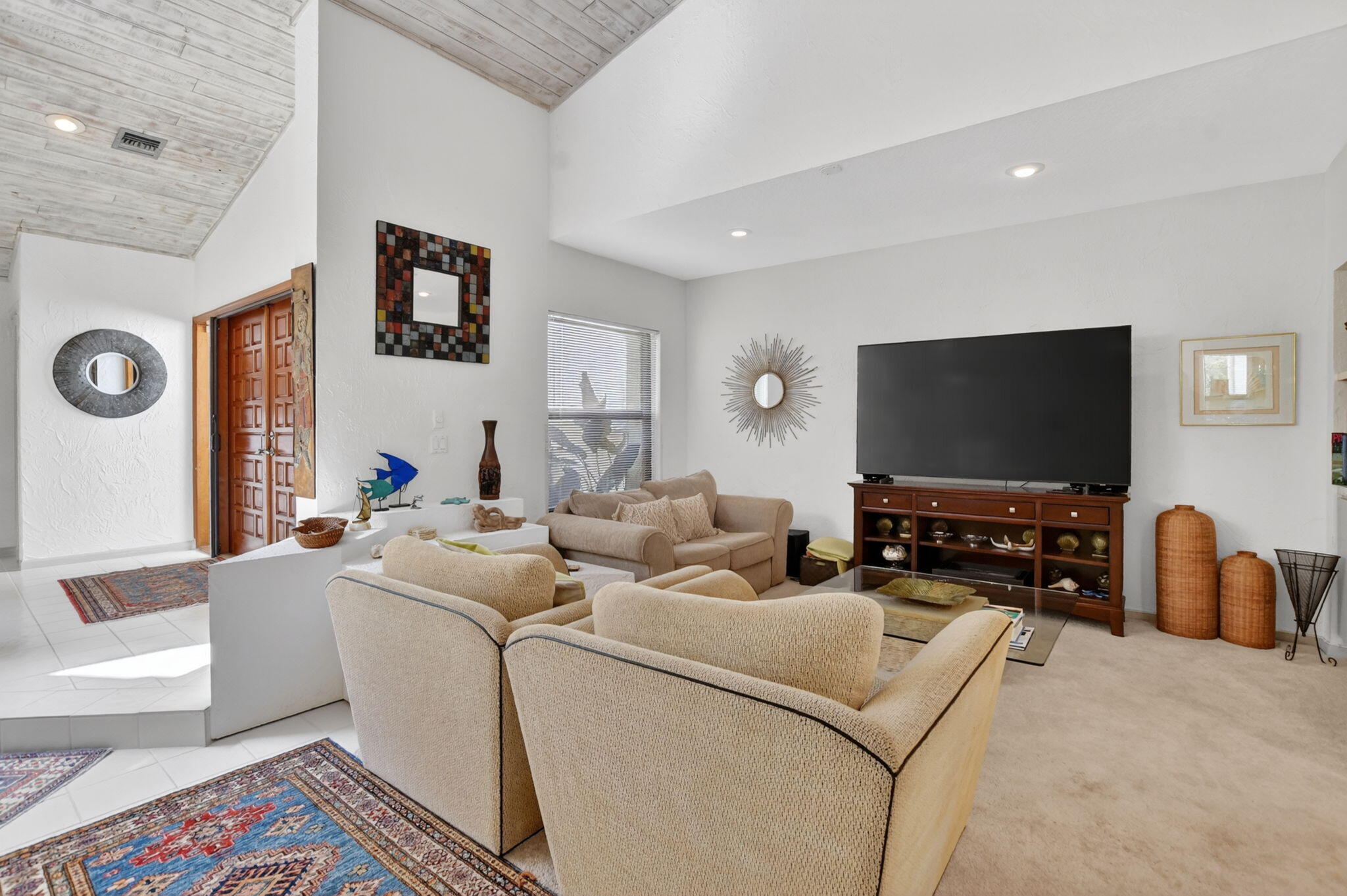 22519 Esplanada Circle, Unit W Boca Raton, FL 33433 - Photo 7 of 57 a living room with furniture and a flat screen tv
