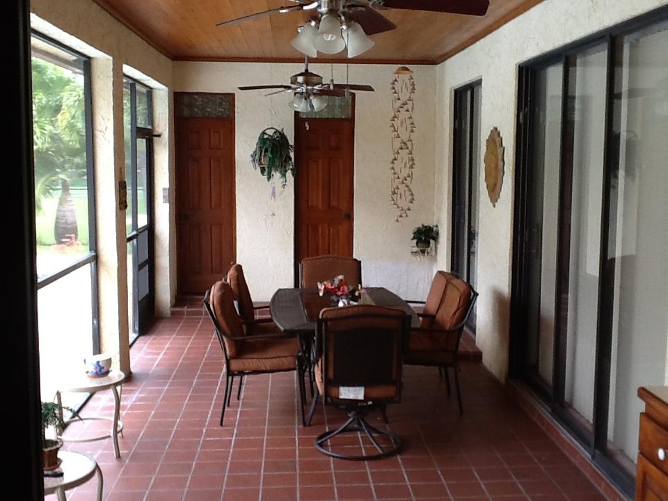 1863 Indian Road West Lake Clarke Shores, FL 33406 - Photo 10 of 12 Covered Patio
