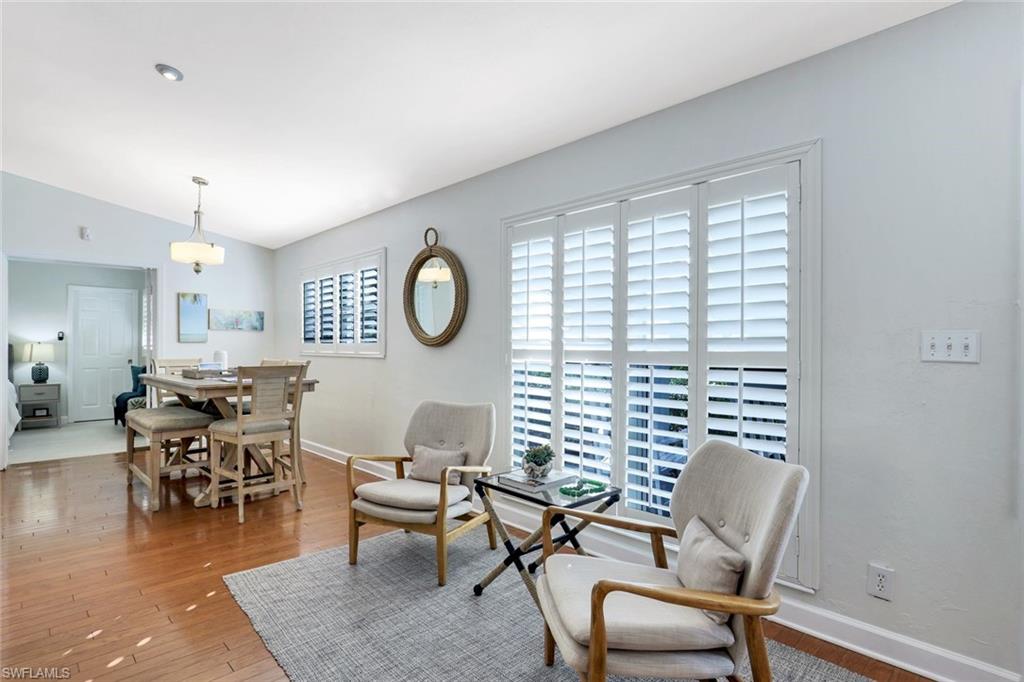 739 7th Avenue North Naples, FL 34102 - Photo 16 of 30 a living room with furniture and a large window