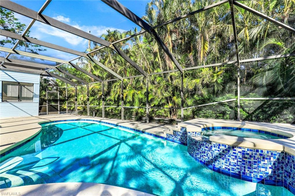 739 7th Avenue North Naples, FL 34102 - Photo 30 of 30 a view of a backyard with sitting area