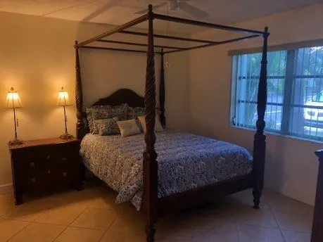 a bedroom with a bed and a closet