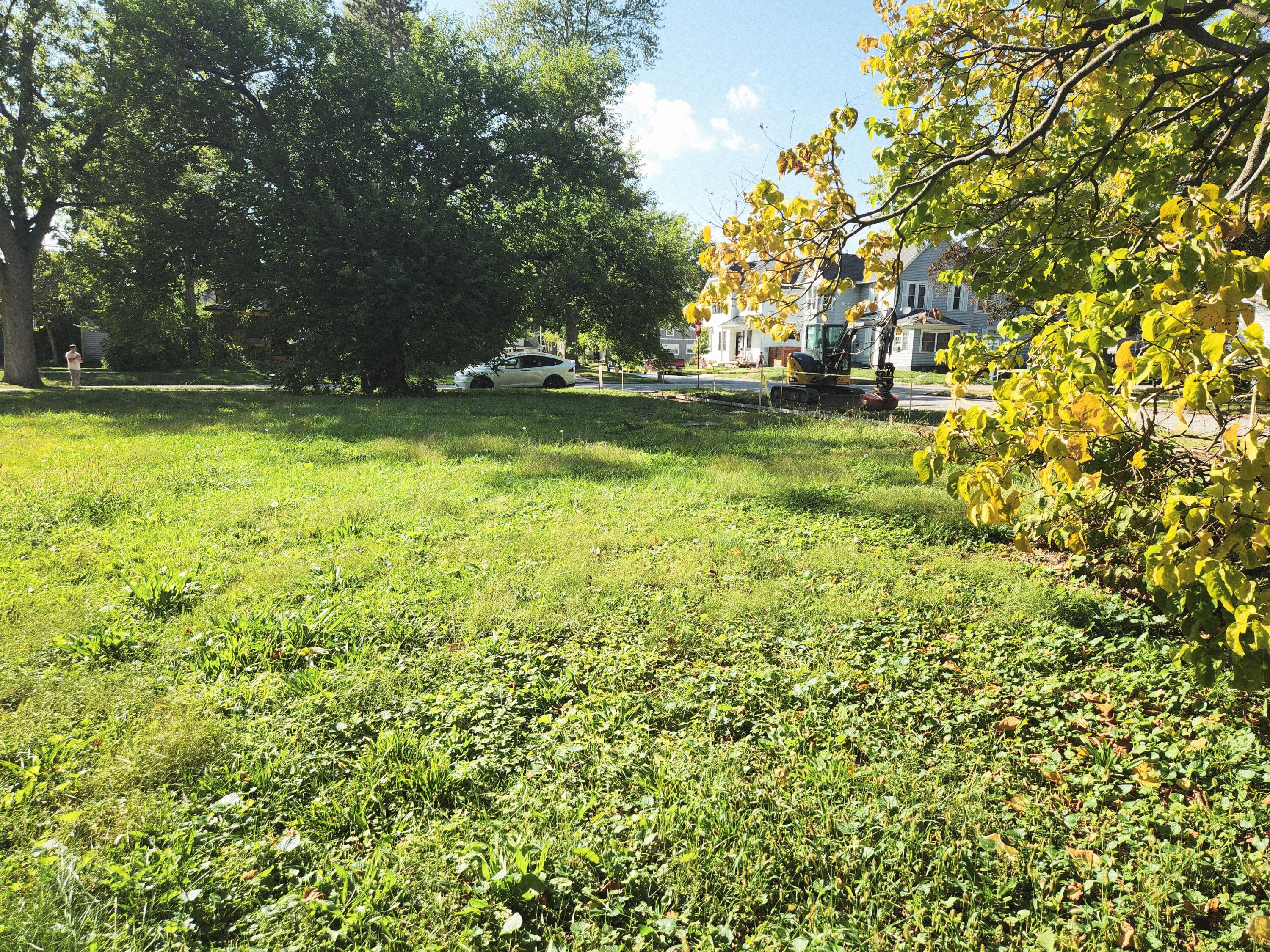 a view of outdoor space with deck and trees