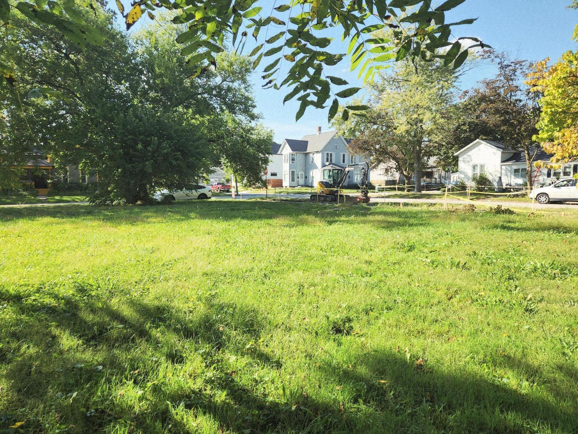8 Wayne Street Valparaiso, IN 46385 - Photo 5 of 11 a view of swimming pool with lawn chairs and plants