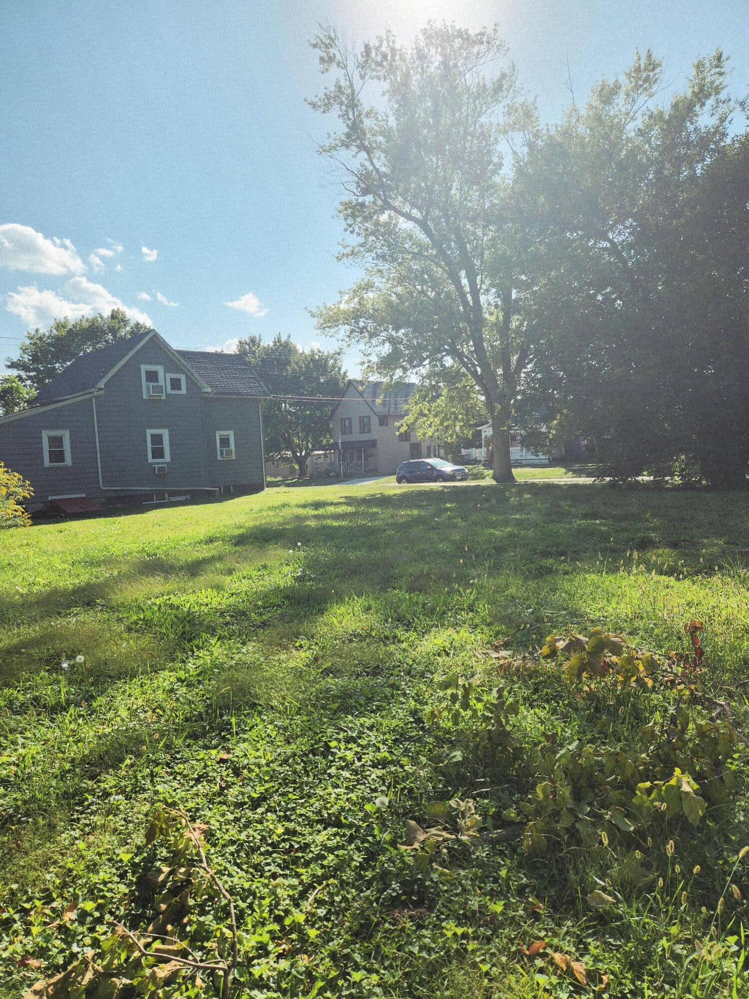 8 Wayne Street Valparaiso, IN 46385 - Photo 6 of 11 a view of a big yard with a house
